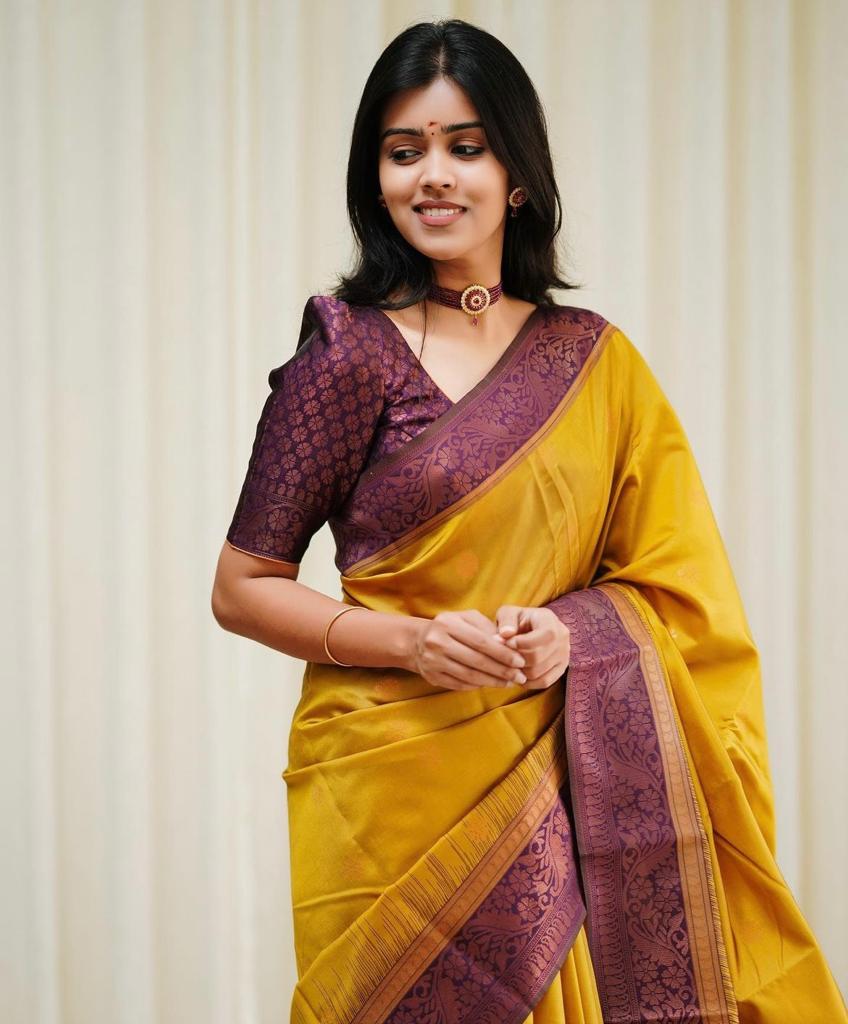 Mellifluous Yellow Soft Silk Saree With Twirling Blouse Piece