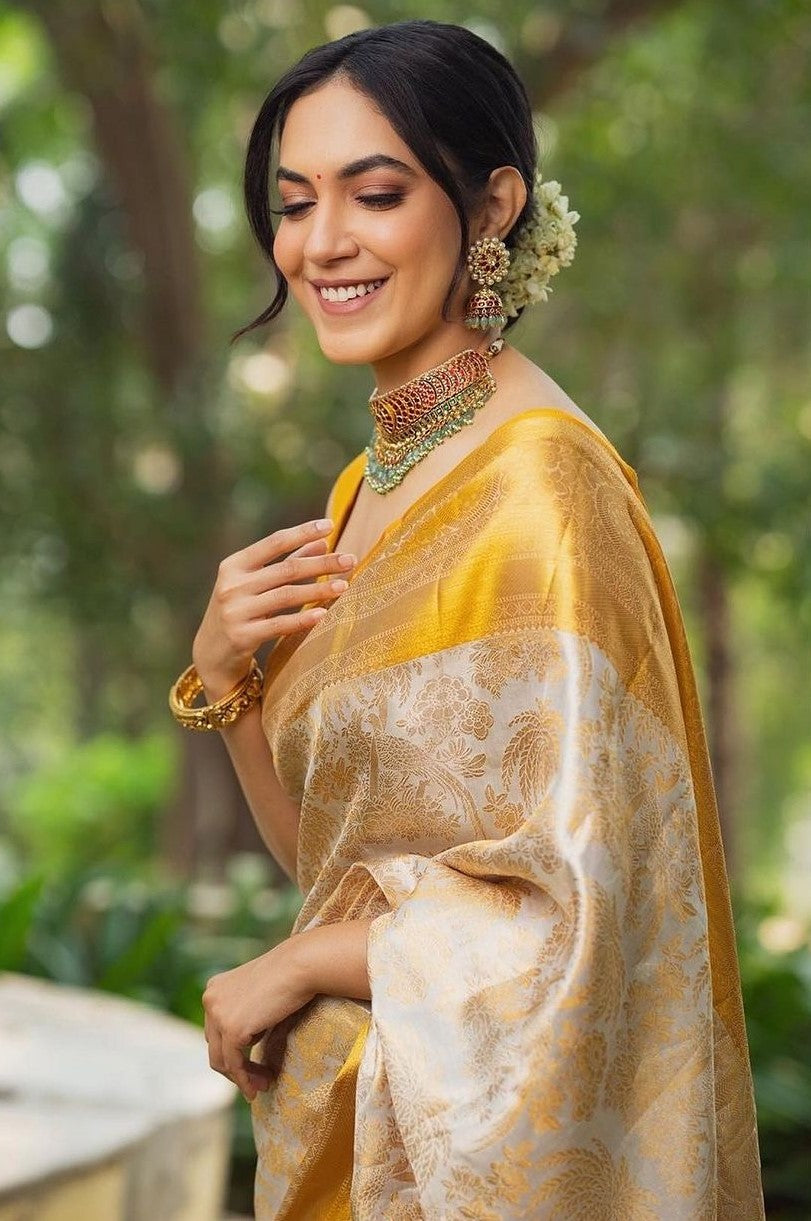 Bewitching Beige Soft Silk Saree With Brood Blouse Piece