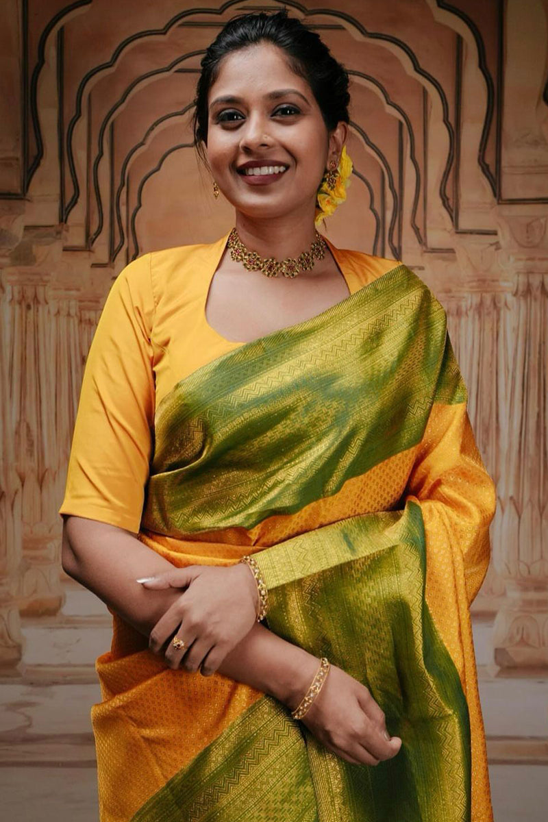 Fantabulous Yellow Soft Silk Saree With Quintessential Blouse Piece