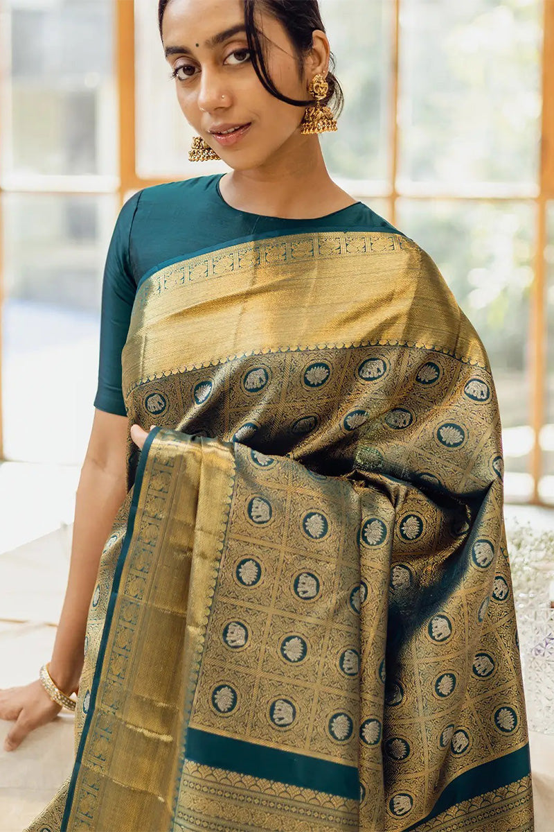 Sizzling Dark Green Soft Silk Saree With Flaunt Blouse Piece