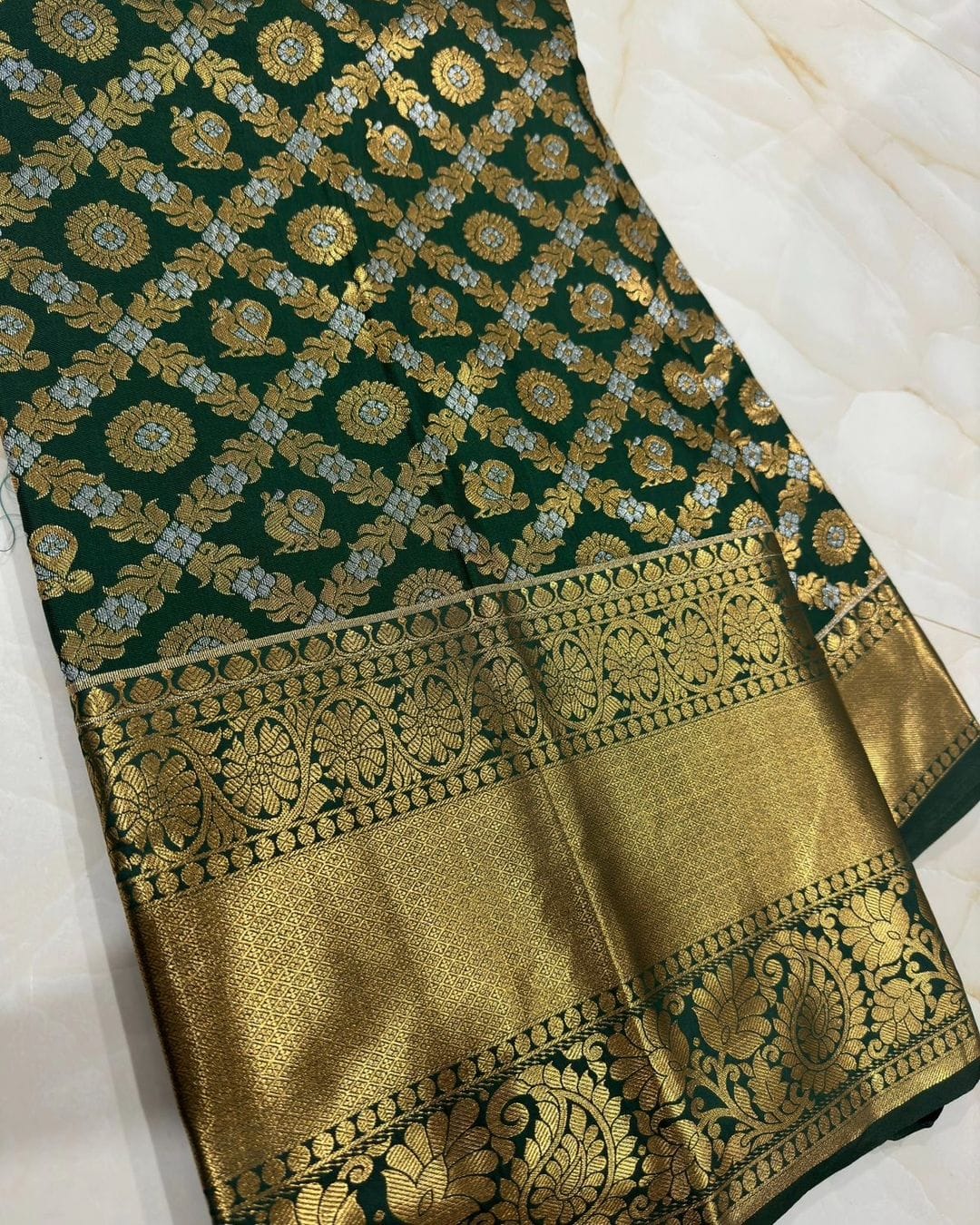 Gorgeous Dark Green Soft Silk Saree With Eye-catching Blouse Piece