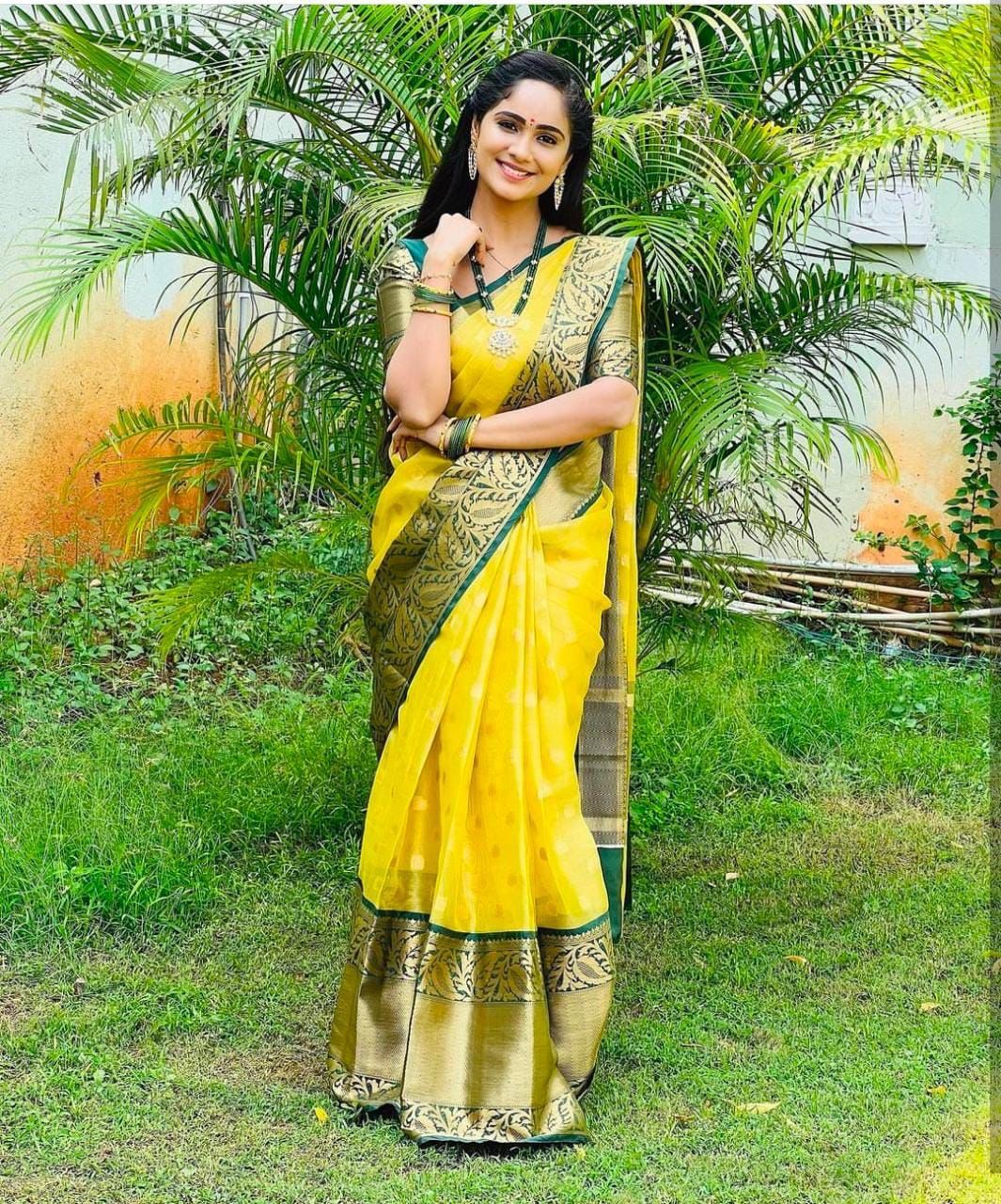 Adorning Yellow Soft Silk Saree With Grandiose Blouse Piece