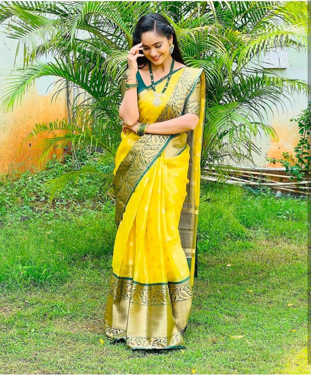 Adorning Yellow Soft Silk Saree With Grandiose Blouse Piece