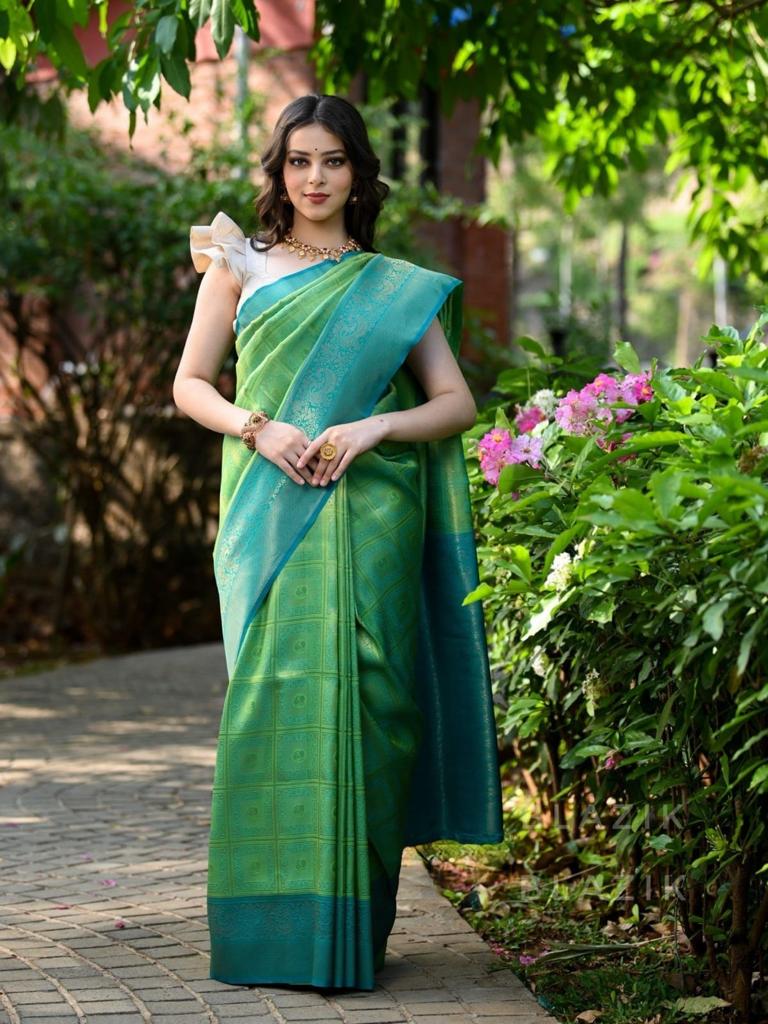 Prominent Sea Green Soft Banarasi Silk Saree With Twirling Blouse Piece