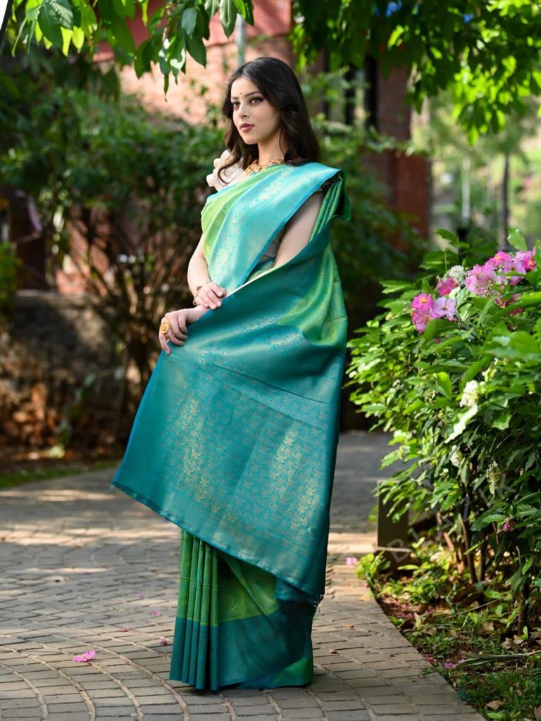 Prominent Sea Green Soft Banarasi Silk Saree With Twirling Blouse Piece