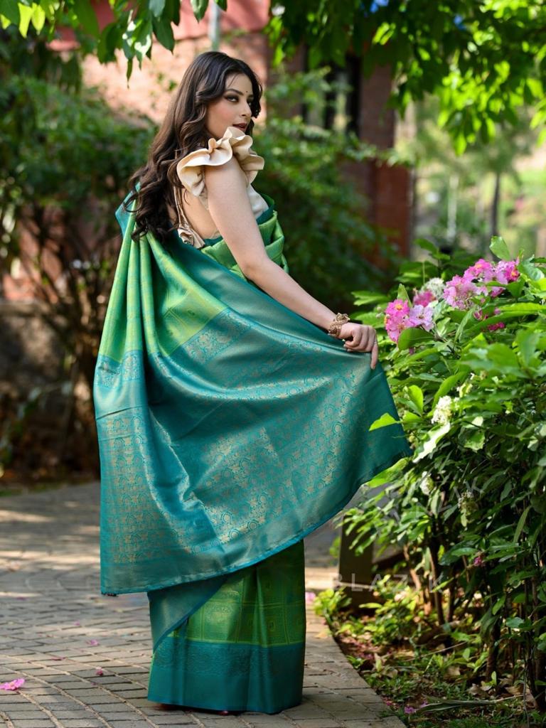 Prominent Sea Green Soft Banarasi Silk Saree With Twirling Blouse Piece