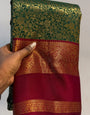 Desirable Dark Green Pure Zari Weaving Banarasi Silk Saree With Beguiling Blouse Piece