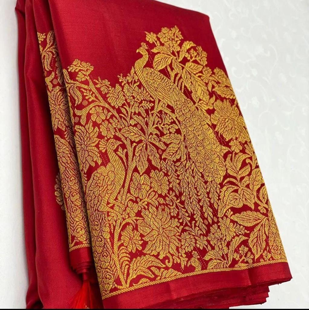 Breathtaking Red Soft Banarasi Silk Saree With Deserving Blouse Piece