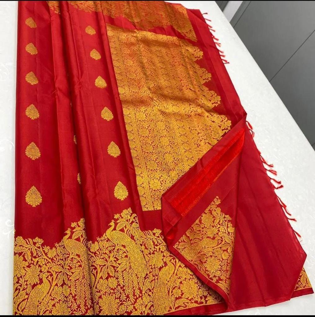 Breathtaking Red Soft Banarasi Silk Saree With Deserving Blouse Piece