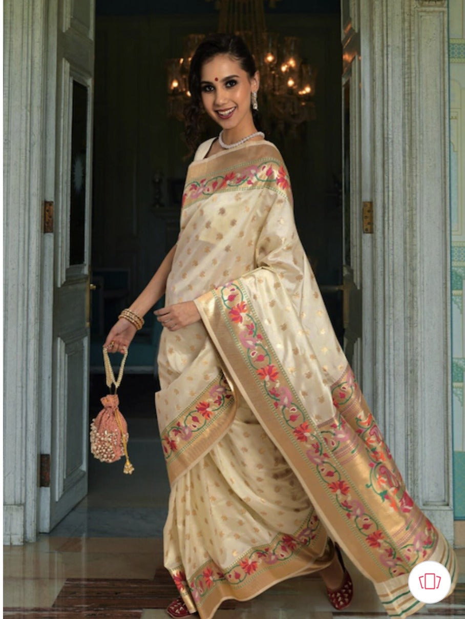 Mesmerising Off White Paithani Silk Saree With Conflate Blouse Piece