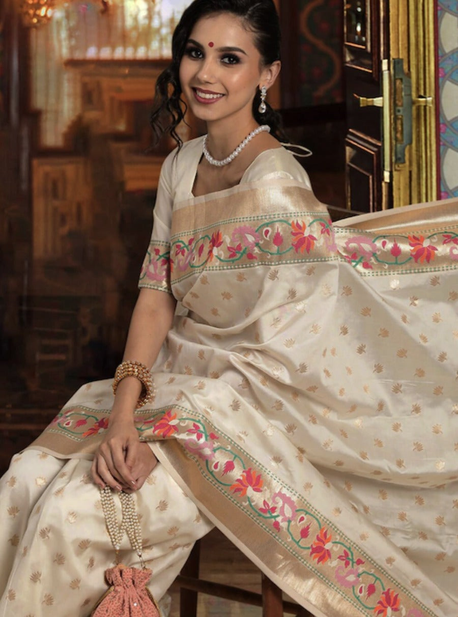 Mesmerising Off White Paithani Silk Saree With Conflate Blouse Piece