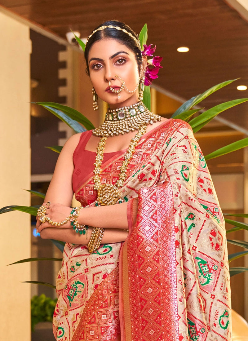 Traditional Beige Patola Silk Saree With Beauteous Blouse Piece