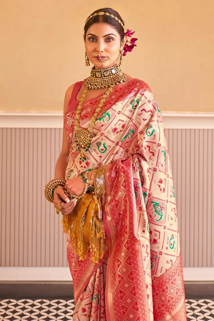 Traditional Beige Patola Silk Saree With Beauteous Blouse Piece