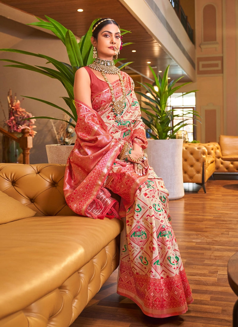 Traditional Beige Patola Silk Saree With Beauteous Blouse Piece