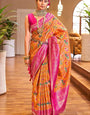 Snappy Orange Patola Silk Saree With Captivating Blouse Piece