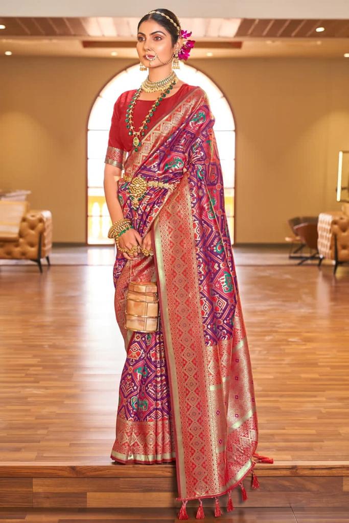 Rhapsodic Purple Patola Silk Saree With Enamoring Blouse Piece