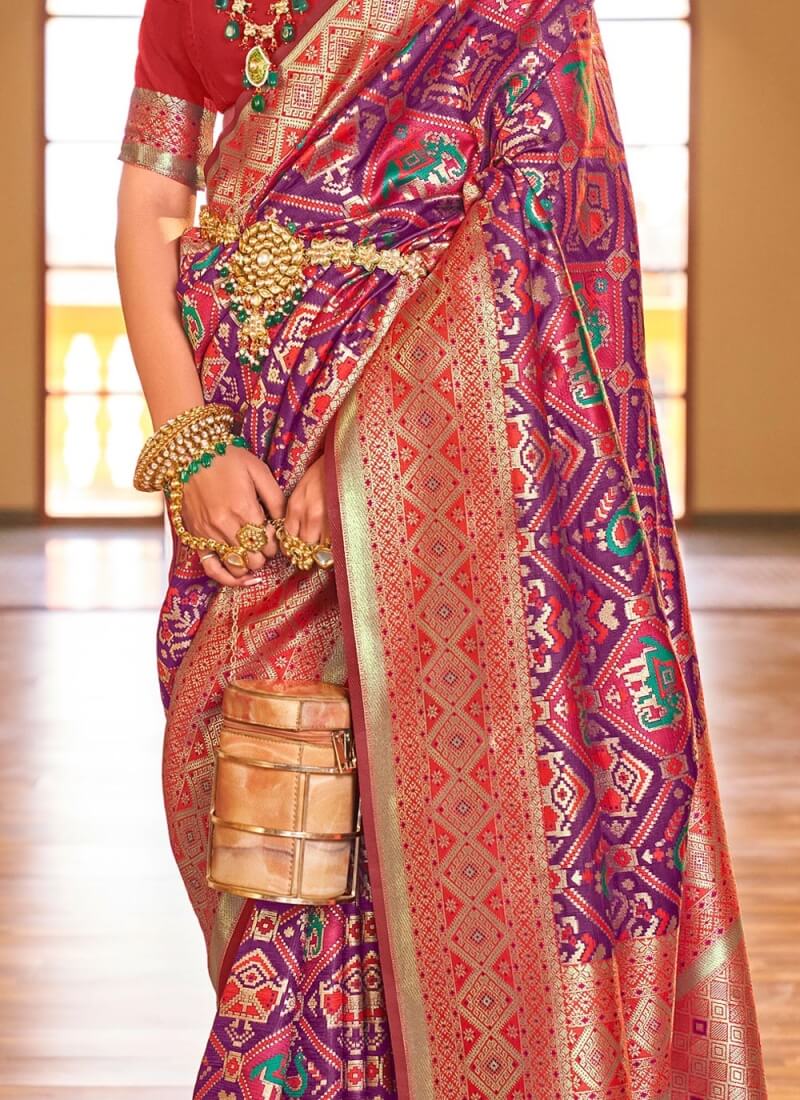 Rhapsodic Purple Patola Silk Saree With Enamoring Blouse Piece