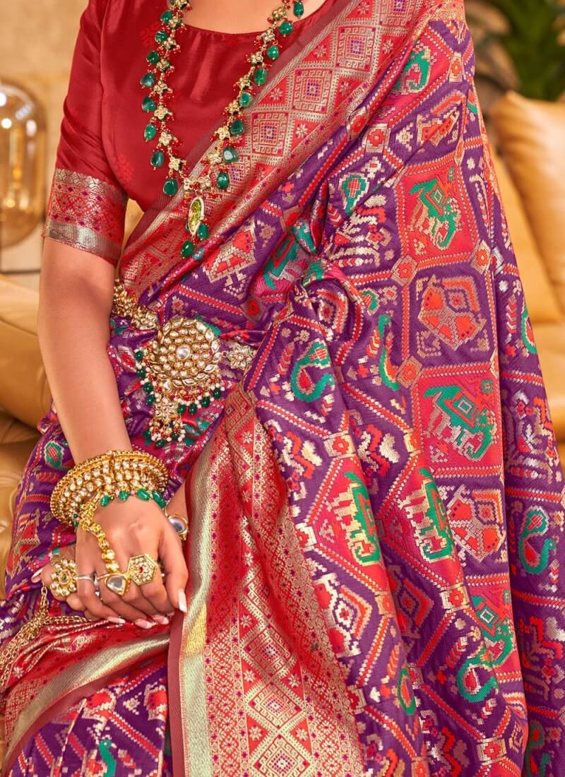 Rhapsodic Purple Patola Silk Saree With Enamoring Blouse Piece