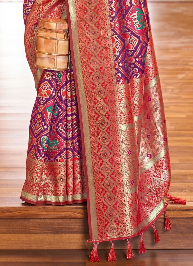 Rhapsodic Purple Patola Silk Saree With Enamoring Blouse Piece