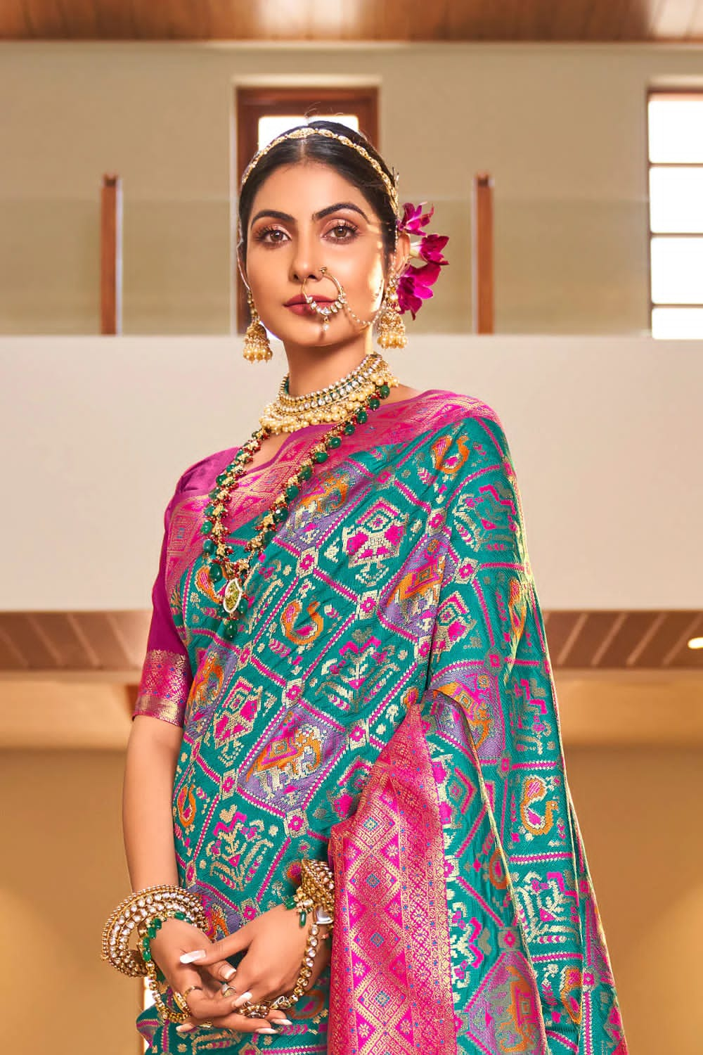 Invaluable Turquoise Patola Silk Saree With Prodigal Blouse Piece