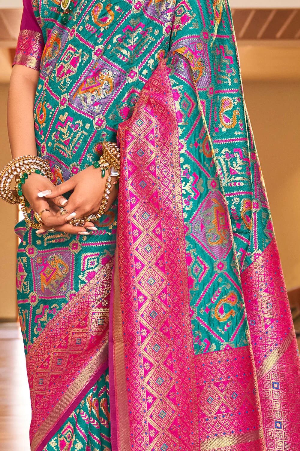 Invaluable Turquoise Patola Silk Saree With Prodigal Blouse Piece