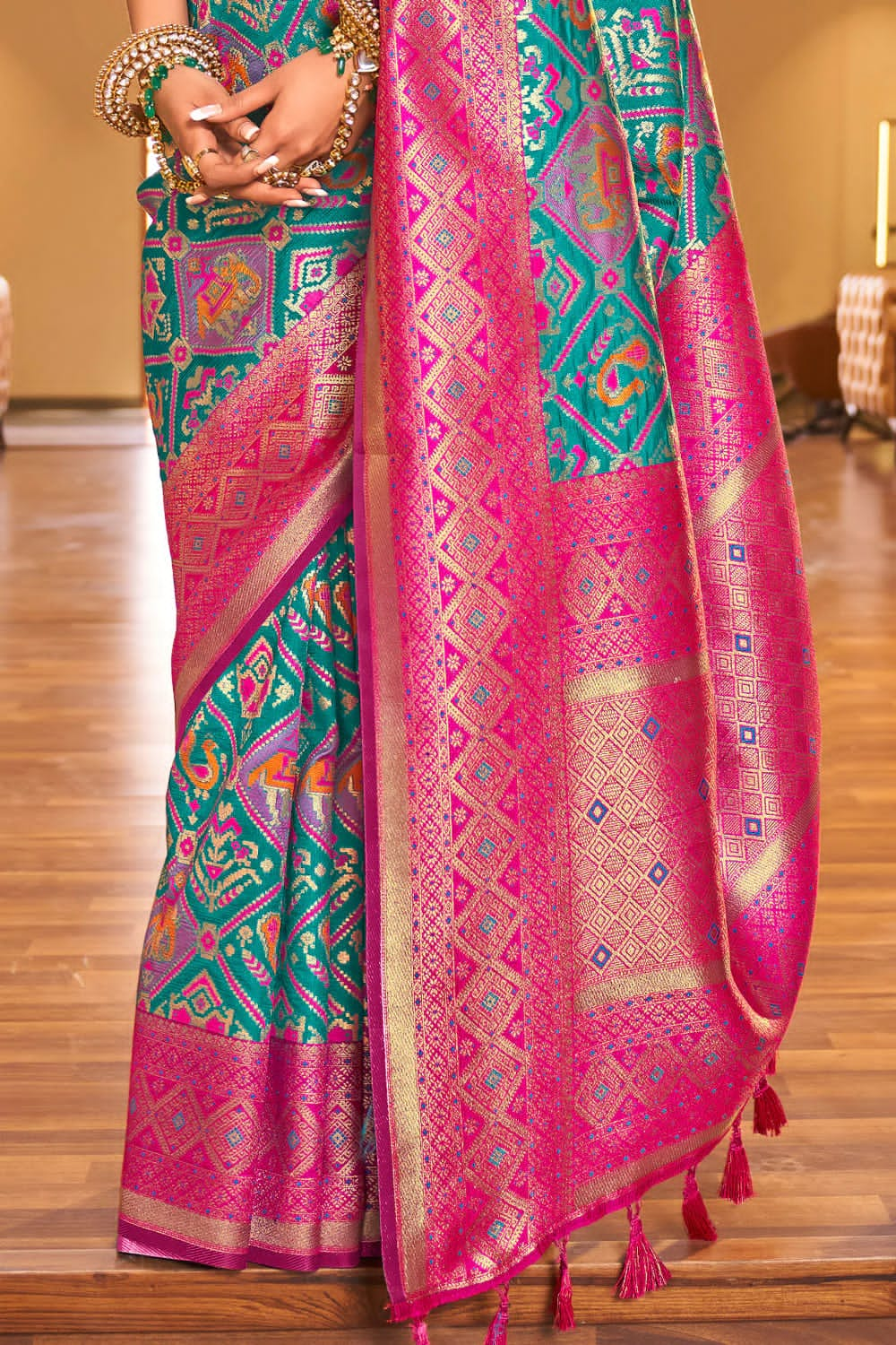 Invaluable Turquoise Patola Silk Saree With Prodigal Blouse Piece