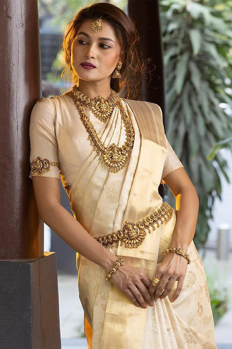 Fugacious Beige Soft Banarasi Silk Saree With Splendorous Blouse Piece