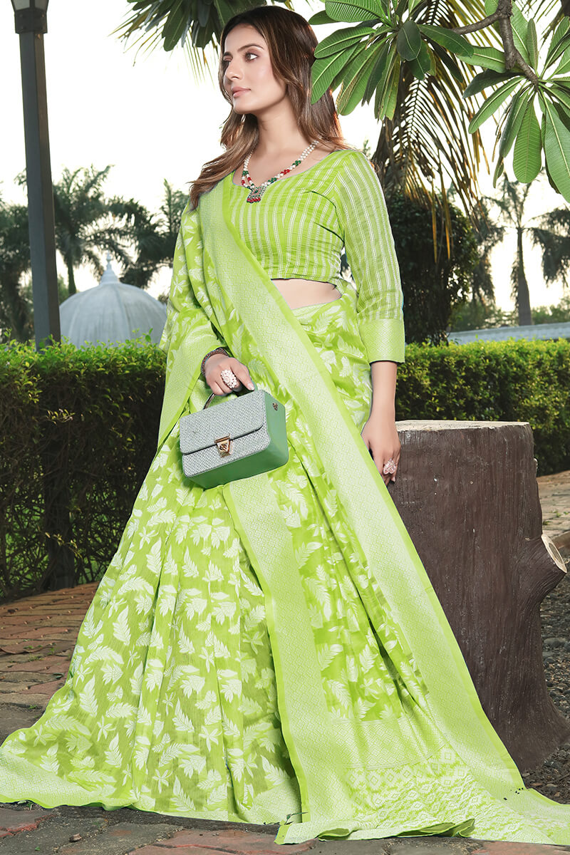 Enchanting Green Cotton Silk Saree With Vivacious Blouse Piece