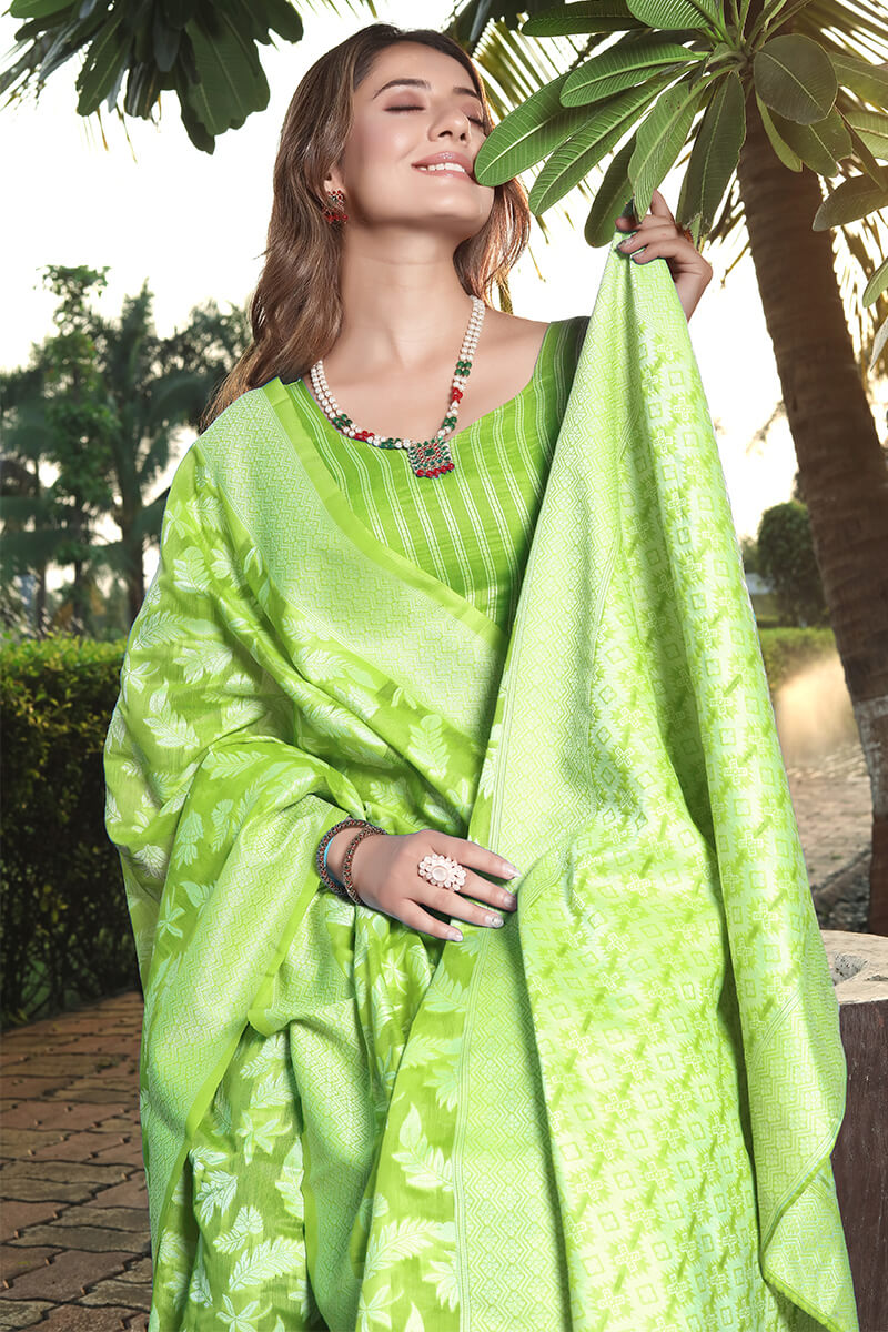 Enchanting Green Cotton Silk Saree With Vivacious Blouse Piece