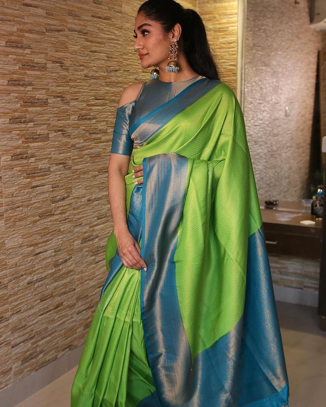 Effulgent Parrot Soft Silk Saree With Resplendent Blouse Piece