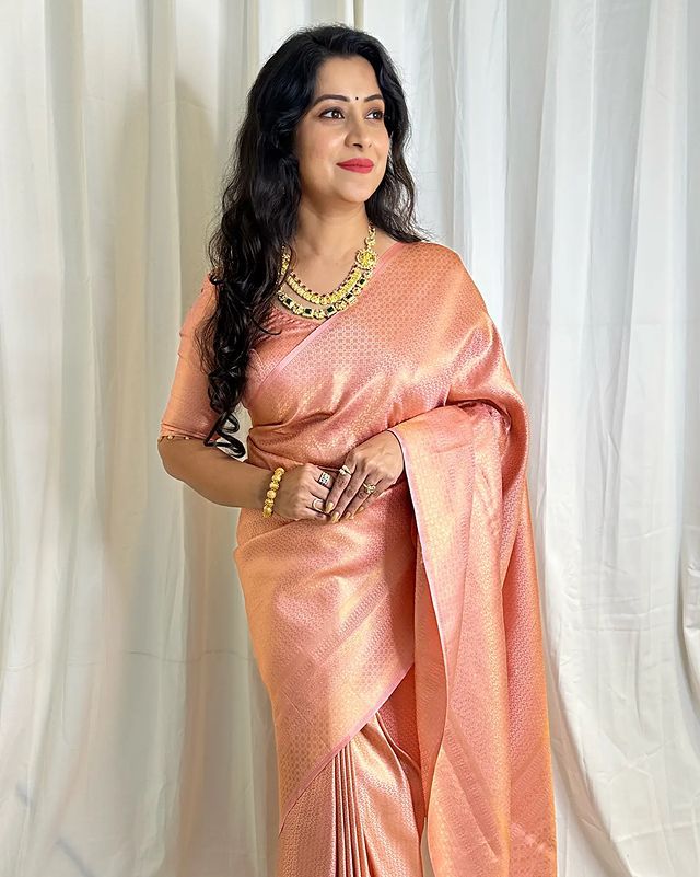 Cynosure Baby Pink Soft Silk Saree With Twirling Blouse Piece