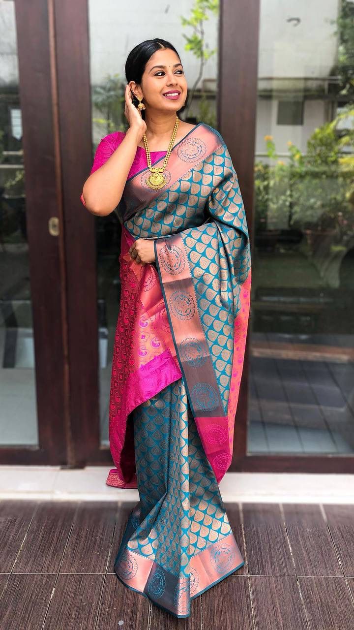 Brood Rama Soft Banarasi Silk Saree With Marvellous Blouse Piece