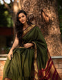 Adorning Green Soft Banarasi Silk Saree With Confounding Blouse Piece