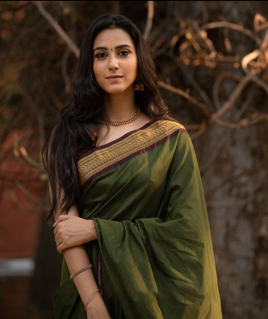 Adorning Green Soft Banarasi Silk Saree With Confounding Blouse Piece