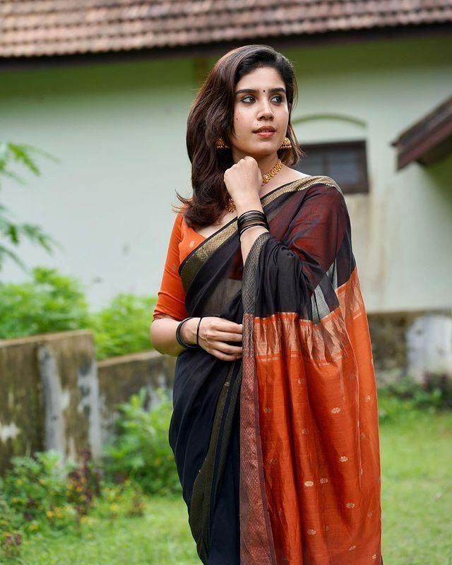 Nemesis Black Soft Silk Saree With Whimsical Blouse Piece