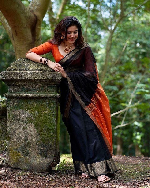 Nemesis Black Soft Silk Saree With Whimsical Blouse Piece