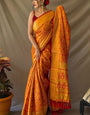 Admirable Mustard Patola Silk Saree with Outstanding Blouse Piece