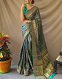 Conflate Navy Blue Patola Silk Saree with Susurrous Blouse Piece