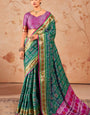 Lissome Green Patola Silk Saree with Conflate Blouse Piece