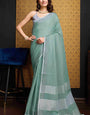 Intricate Green Cotton Silk Saree With Evanescent Blouse Piece