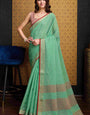 Elegant Sea Green Cotton Silk Saree With Opulent Blouse Piece