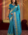 Pulsating Firozi Patola Silk Saree with Imaginative Blouse Piece