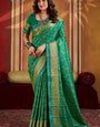 Majestic Green Patola Silk Saree with Winsome Blouse Piece