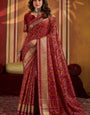 Jazzy Maroon Patola Silk Saree with Sempiternal Blouse Piece