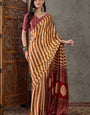 Sensational Mustard Ajrakh Printed Semi Modal Silk Saree With Adoring Blouse Piece