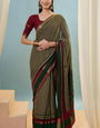Enigmatic Dark Green Printed Cotton Silk Saree With Arresting Blouse Piece