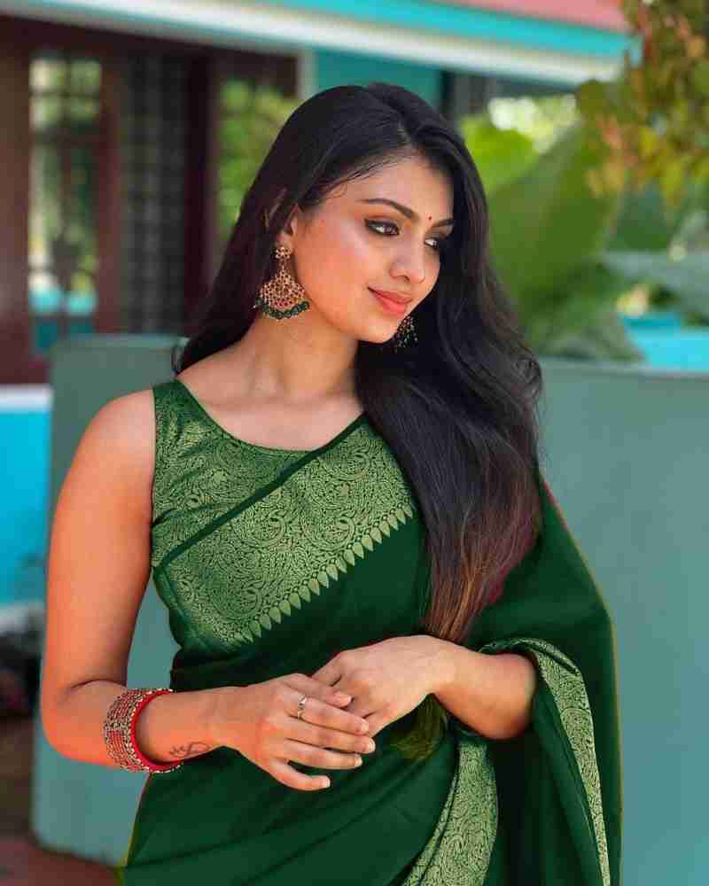 Jazzy Green Soft Silk Saree With An Blouse Piece