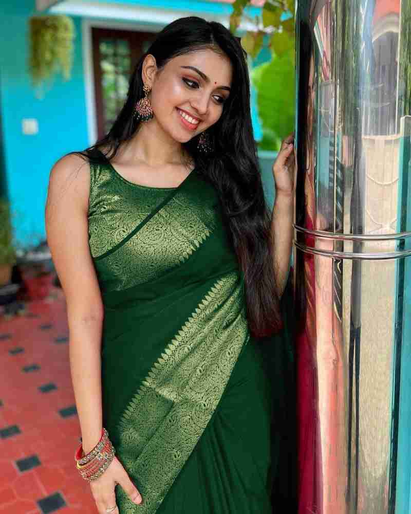 Jazzy Green Soft Silk Saree With An Blouse Piece