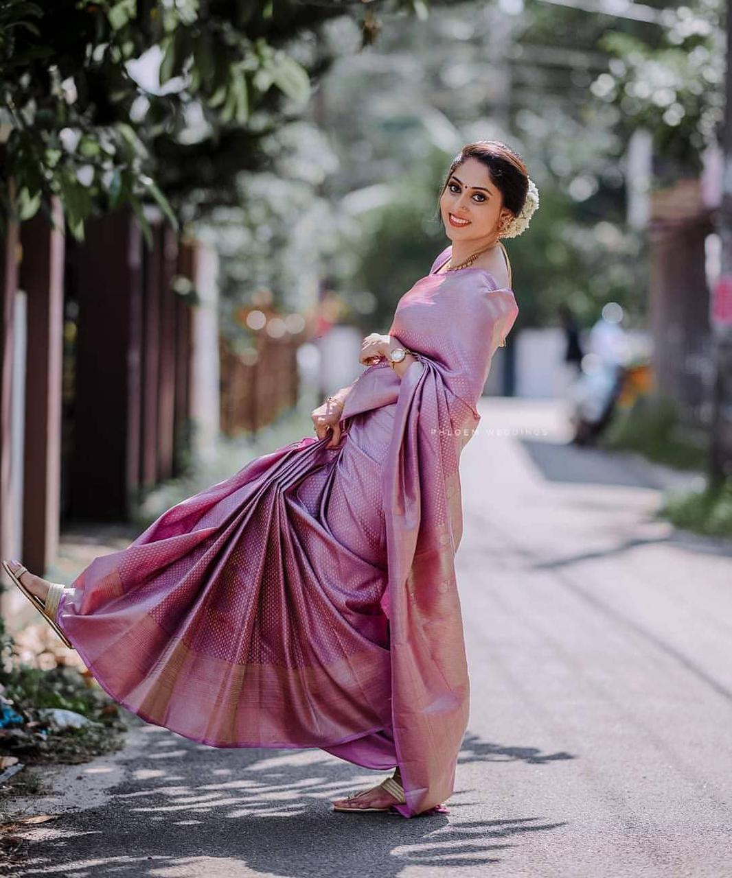 Evocative Pink Soft Silk Saree With Efflorescence Blouse Piece