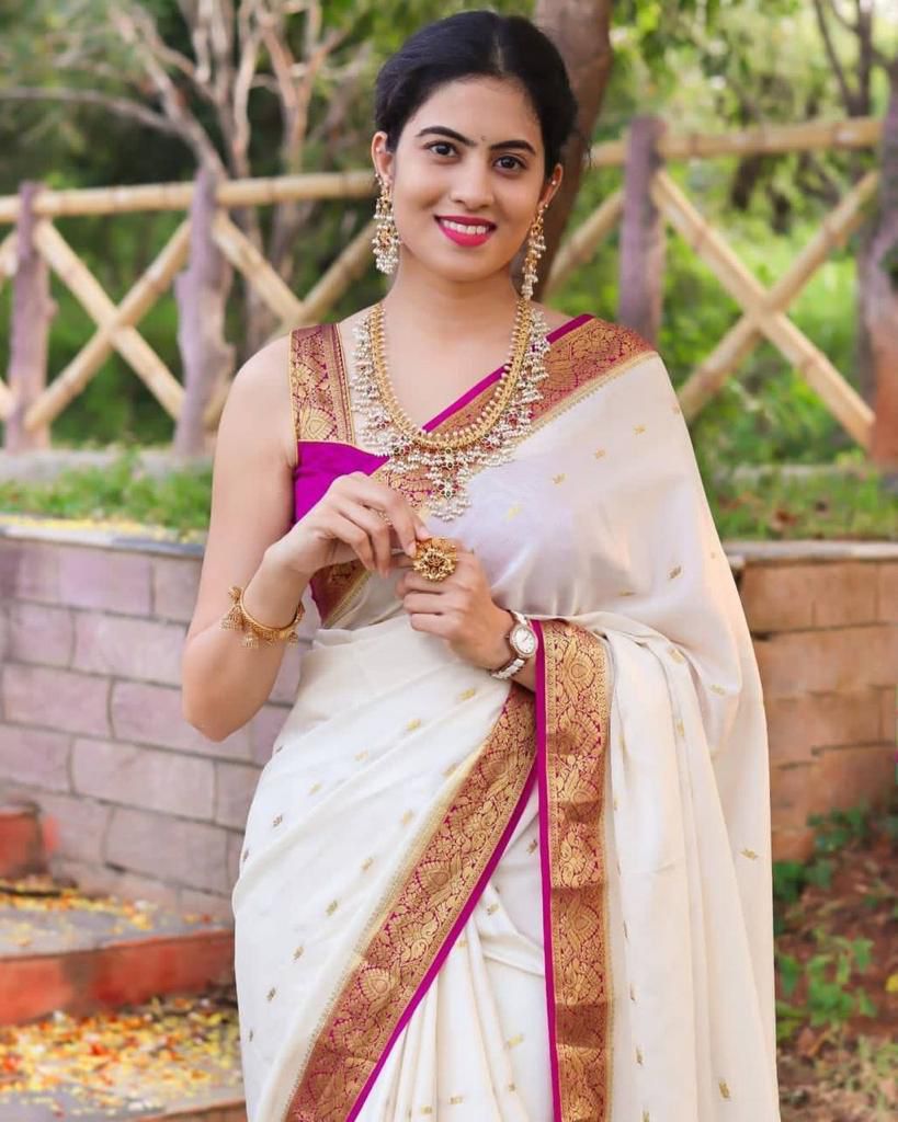 Snazzy Off White Soft Silk Saree With Wonderful Blouse Piece